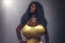 Busty Asian girl oils up